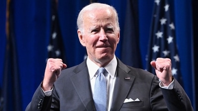 Joe Biden: US President Joe Biden gestures as he arrives to speak at a reception. (AFP)