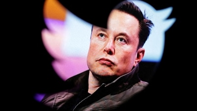 FILE PHOTO: Elon Musk's photo is seen through a Twitter logo in this illustration taken October 28, 2022. REUTERS/Dado Ruvic/Illustration/File Photo (REUTERS)