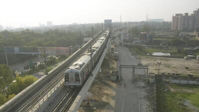 A Metro train leaves the Hindon Metro station, in Ghaziabad. (Sakib Ali/HT Photo)