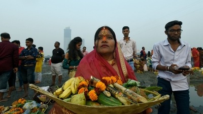 Many devotees also performed the rituals in makeshift ponds on rooftops due to factors such as long distance to the water bodies, pollution and age. (HT Photo/Sunil Ghosh) Many devotees also performed the rituals in makeshift ponds on rooftops due to factors such as long distance to the water bodies, pollution and age. (HT Photo/Sunil Ghosh)