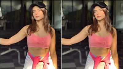 Aamna further added a black cap and a white and pink jacket tied to her waist to give her look a more casual vibe.  (Instagram/@aamnasharifofficial)