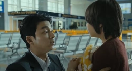 Gong Yoo and Kim Su-an in a still from Train to Busan.