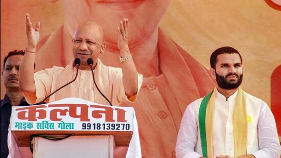 Uttar Pradesh chief minister Yogi Adityanath campaigning for the Gola Gokarannath assembly by-poll in Lakhimpur Kheri district. (PTI PHOTO)