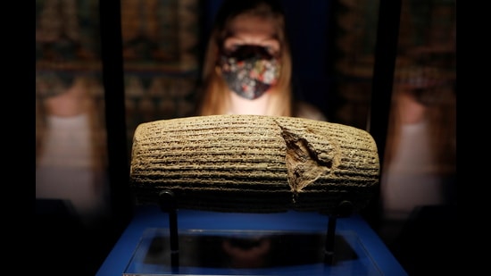 The Cyrus Cylinder, loaned by the British Museum, on display at Epic Iran, an exhibition at the V&A in London in May 2021. (Peter Nicholls/REUTERS)