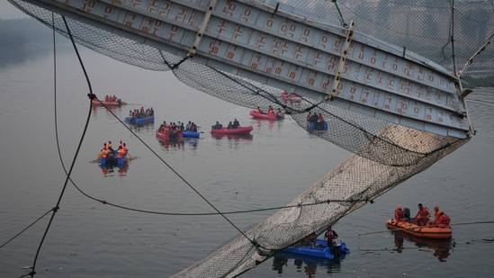 Prime Minister Narendra Modi, who was in his home state of Gujarat on a three-day visit, said he was “deeply saddened by the tragedy.” His office announced compensation to the families of the dead and urged for speedy rescue efforts.(AP)