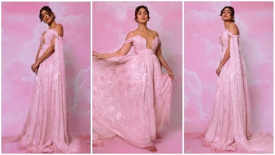 Mrunal Thakur looks like a princess straight out of a fairy tale in this dreamy pink gown featuring floor-sweeping trail(Instagram/@mrunalthakur)