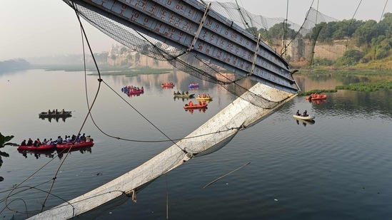 Live video reports showed hundreds of others desperately clinging to the broken structure and trying to make their way to safety, as crowds onshore shouted or swam to try to rescue who had fallen in.(AFP)