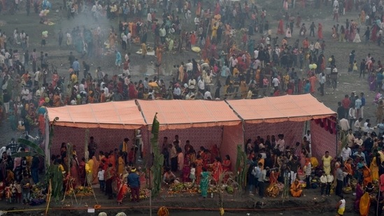 The four-day-long Chhath Puja festival which commenced on October 28 and will conclude today, October 31. Devotees gathered on the banks of rivers and ponds to worship the rising sun on the last day of the festival. (HT Photo/Sunil Ghosh)