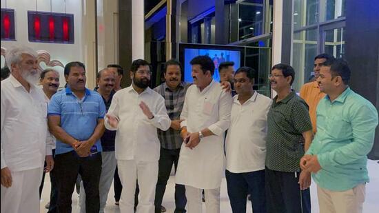 Rebel leaders with Eknath Shinde, at Radisson Blu hotel in Guwahati in June. (ANI)