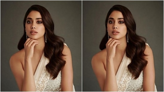 Styled by fashion stylist Tanya Ghavri, Janhvi wore her tresses open in wavy curls with a side part as she posed for the pictures. (Instagram/@janhvikapoor)