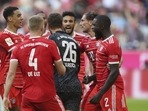 Bayern's goalkeeper Sven Ulreich is congratulated by his teammates after saving a penalty kick(AP) Bayern's goalkeeper Sven Ulreich is congratulated by his teammates after saving a penalty kick(AP)