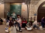 Covid In China: People sit inside the Shanghai Disney Resort.