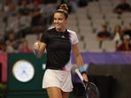 Maria Sakkari, of Greece, reacts during her match against Jessica Pegula in the WTA Finals tennis tournament