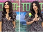 Harnaaz Sandhu looks gorgeous in a printed deep-neck dress for a photoshoot. 