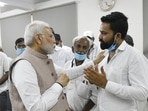 (Image tweeted by PM) PM Modi meets bereaved families to extend condolences over the horrific Morbi bridge collapse. 