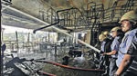Fire brigade staff in action at restaurant ‘Vegeta’ in Lullanagar area of Pune on Tuesday. (Rahul Raut/HT PHOTO) Fire brigade staff in action at restaurant ‘Vegeta’ in Lullanagar area of Pune on Tuesday. (Rahul Raut/HT PHOTO)
