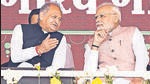 Prime Minister Narendra Modi interacts with Rajasthan chief minister Ashok Gehlot in Banswara on Tuesday. (ANI) Prime Minister Narendra Modi interacts with Rajasthan chief minister Ashok Gehlot in Banswara on Tuesday. (ANI)