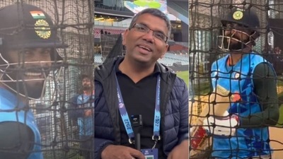 Virat Kohli interacts with reporter during India's net session Virat Kohli interacts with reporter during India's net session