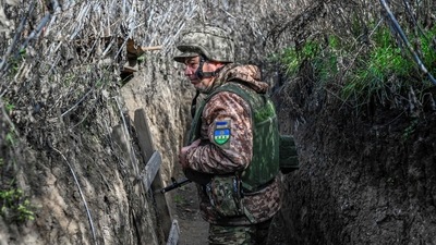 Russia-Ukraine War: A Ukrainian soldier walks along a trench at the Kherson border region. (AFP) Russia-Ukraine War: A Ukrainian soldier walks along a trench at the Kherson border region. (AFP)