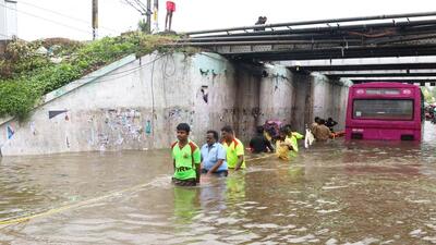 Rescue operations underway after the MTC bus gets trapped in a waterlogged underpass following heavy rainfall, in Chennai on Tuesday. (ANI) Rescue operations underway after the MTC bus gets trapped in a waterlogged underpass following heavy rainfall, in Chennai on Tuesday. (ANI)