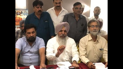 Members of Land Dealers and Colonisers Association Punjab addressing the media persons in Ludhiana. The association announced to launch a protest against the Aam Aadmi Party government (AAP) in Punjab (Gurpreet Singh/HT)