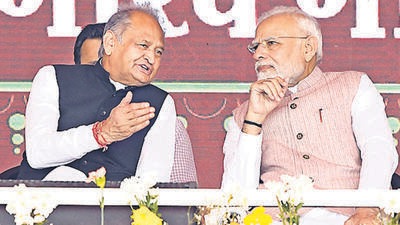 Prime Minister Narendra Modi interacts with Rajasthan chief minister Ashok Gehlot in Banswara on Tuesday. (ANI) Prime Minister Narendra Modi interacts with Rajasthan chief minister Ashok Gehlot in Banswara on Tuesday. (ANI)