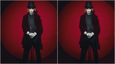 Ishaan got into the character in a black overcoat with wrap details and featuring silver buttons and silver chain. He further teamed it with a pair of black formal trousers. (Instagram/@ishaankhatter) Ishaan got into the character in a black overcoat with wrap details and featuring silver buttons and silver chain. He further teamed it with a pair of black formal trousers. (Instagram/@ishaankhatter)
