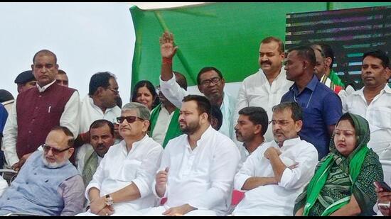 Bihar deputy CM Tejashwi Yadav with JD(U) national president Lallan Singh in Mokama on Tuesday. (Santosh Kumar/HT Photo) Bihar deputy CM Tejashwi Yadav with JD(U) national president Lallan Singh in Mokama on Tuesday. (Santosh Kumar/HT Photo)