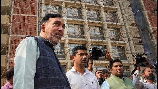 Delhi environment minister Gopal Rai at the site of the BJP offices. (PTI)