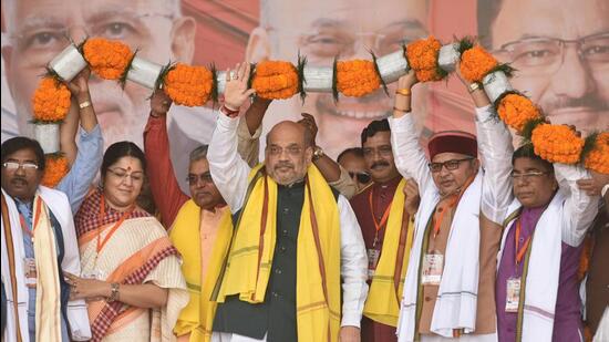 Union home minister Amit Shah (centre) with state BJP leaders at a mass rally in support of Citizenship Amendment Act in Kolkata, West Bengal. (Samir Jana/ HT File Photo)