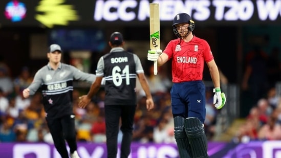 Jos Buttler raises his bat after completing fifty during the T20 World Cup 2022 match against New Zealand at The Gabba, in Brisbane on Tuesday(ANI)
