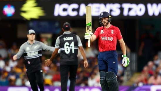 England's Jos Buttler raises his bat after completing fifty during the ICC Men's T20 World Cup 2022 match against New Zealand at The Gabba (ANI)
