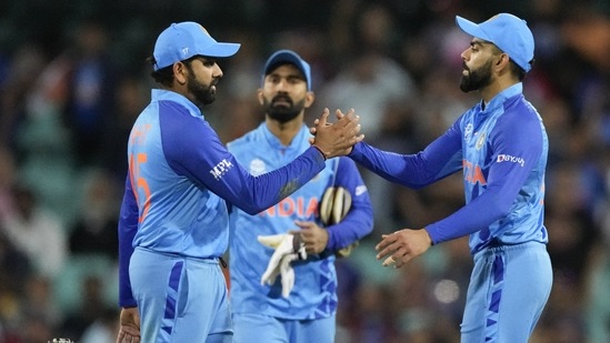 India's Rohit Sharma, left, and Virat Kohli shake hands after the T20 World Cup cricket match(AP)