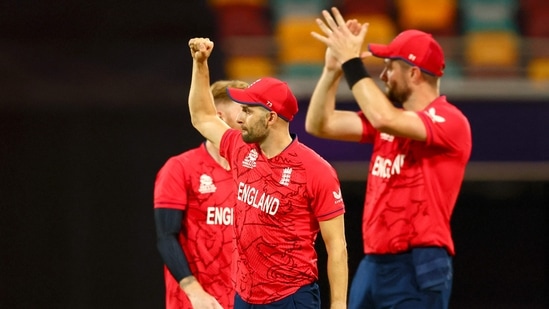England players celebrate their win during the ICC T20 World Cup 2022 match between England and New Zealand at The Gabba(AFP)