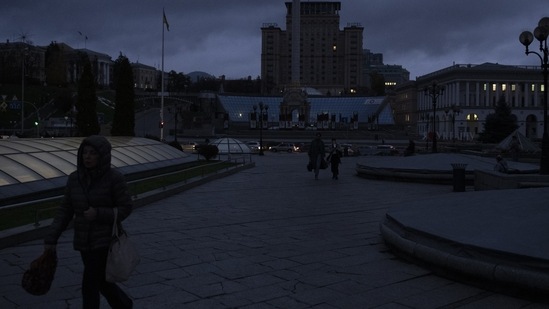 Russian-Ukraine War: People walk in Independence Square at twilight in Kyiv, Ukraine. (AP)