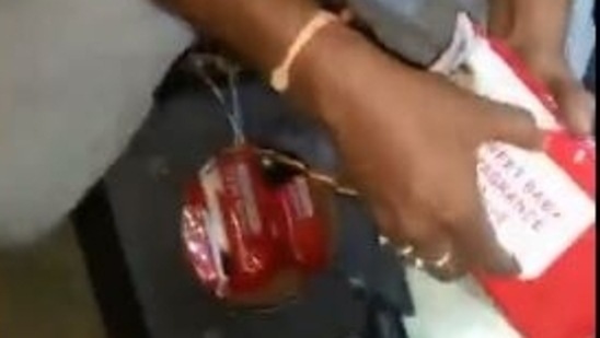 A video shared by the chief minister showed the police taking out the baby wipe packets from the sound box and further tearing the packets to reveal the drug-filled soap cases.(Twitter screengrab)