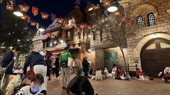 People sit inside the Shanghai Disney Resort amidst the coronavirus disease (COVID-19) outbreak, in Shanghai, China October 31, 2022 in this picture obtained by REUTERS. THIS IMAGE HAS BEEN SUPPLIED BY A THIRD PARTY. NO RESALES. NO ARCHIVES. (via REUTERS)