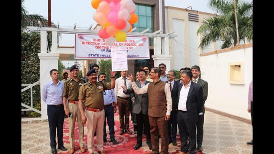 DGP Dilbag Singh releasing balloons to mark first raising day of SIA in Miran Sahib in Jammu district on Tuesday. (HT Photo)