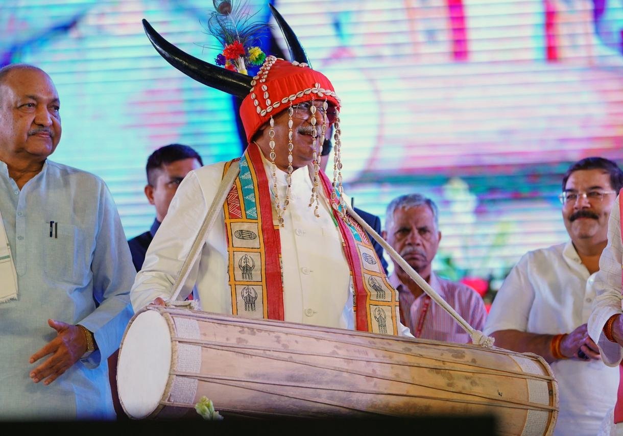 Chhattisgarh Chief Minister Bhupesh Baghel wearing a traditional attire tries his hands on playing drum at the inauguration of the third edition of National Tribe Dance Festival, in Raipur on Tuesday. (ANI) Chhattisgarh Chief Minister Bhupesh Baghel wearing a traditional attire tries his hands on playing drum at the inauguration of the third edition of National Tribe Dance Festival, in Raipur on Tuesday. (ANI)