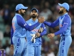 Rohit Sharma, left, and Virat Kohli shake hands after the T20 World Cup cricket match between India and the Netherlands in Sydney.