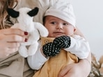 Mittens made from good quality fabric help in protecting babies from winter chill.