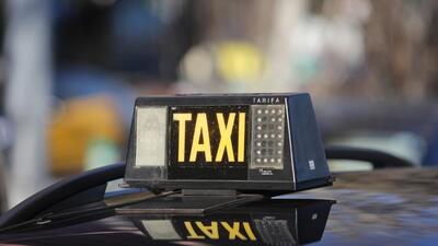 A cab roof sign during a protest by taxi drivers against the use of Uber Inc. and Cabify ride-hailing apps in Barcelona, Spain, on Thursday, Feb. 10, 2022. Uber returned to the city of Barcelona in 2021 after a 2-year hiatus, following a ruling by regional authorities that rides arranged through mobile apps had to be booked at least 15 minutes in advance. Photographer: Angel Garcia/Bloomberg (Bloomberg) A cab roof sign during a protest by taxi drivers against the use of Uber Inc. and Cabify ride-hailing apps in Barcelona, Spain, on Thursday, Feb. 10, 2022. Uber returned to the city of Barcelona in 2021 after a 2-year hiatus, following a ruling by regional authorities that rides arranged through mobile apps had to be booked at least 15 minutes in advance. Photographer: Angel Garcia/Bloomberg (Bloomberg)