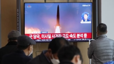 A TV screen shows a file image of North Korea's missile launch. (AP)
