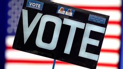US Midterm Election: An attendee's sign reading "Vote" is pictured during a campaign event. (AFP) US Midterm Election: An attendee's sign reading "Vote" is pictured during a campaign event. (AFP)
