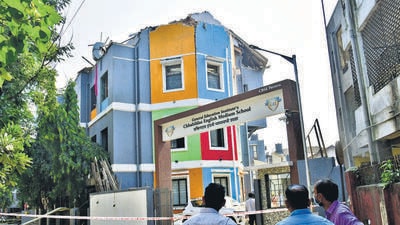 Mumbai, India - November 02, 2022: Three persons injured and two cars damaged after a level 1 blaze broke out early morning in the kitchen of a ground-plus-two-floor Chhabildas English Medium School (CBSE) building due to an LPG cylinder blast, on Akashikar Path, Dadar, in Mumbai, India, on Wednesday, November 02, 2022. (Photo by Bhushan Koyande/HT Photo) (HT PHOTO) Mumbai, India - November 02, 2022: Three persons injured and two cars damaged after a level 1 blaze broke out early morning in the kitchen of a ground-plus-two-floor Chhabildas English Medium School (CBSE) building due to an LPG cylinder blast, on Akashikar Path, Dadar, in Mumbai, India, on Wednesday, November 02, 2022. (Photo by Bhushan Koyande/HT Photo) (HT PHOTO)