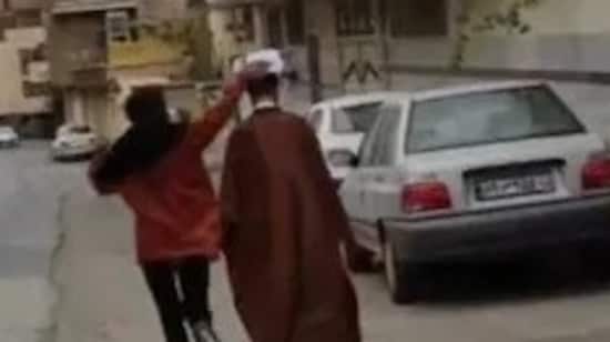 Iran Anti-Hijab Protests: Young Iranians have been seen knocking turbans off clerics.(Twitter)