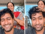 Vicky Kaushal enjoys head massage from his mother Veena Kaushal. Vicky Kaushal enjoys head massage from his mother Veena Kaushal.