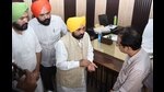 Chief Minister Bhagwant Mann interacting with locals during the surprise visit at Tehsil office and facility center of Samrala in Ludhiana on Thursday (Photo Hindustan Times) Chief Minister Bhagwant Mann interacting with locals during the surprise visit at Tehsil office and facility center of Samrala in Ludhiana on Thursday (Photo Hindustan Times)