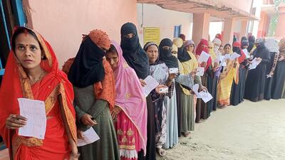 Women voters wait in a queue to cast their votes for assembly bypolls in Bihar's Gopalganj assembly constituency on Thursday. (ANI) Women voters wait in a queue to cast their votes for assembly bypolls in Bihar's Gopalganj assembly constituency on Thursday. (ANI)