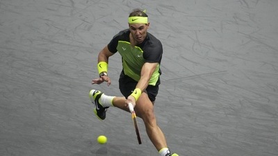 Rafael Nadal of Spain returns the ball to Tommy Paul of the United States during their second round match of the Paris Masters tennis tournament (AP)